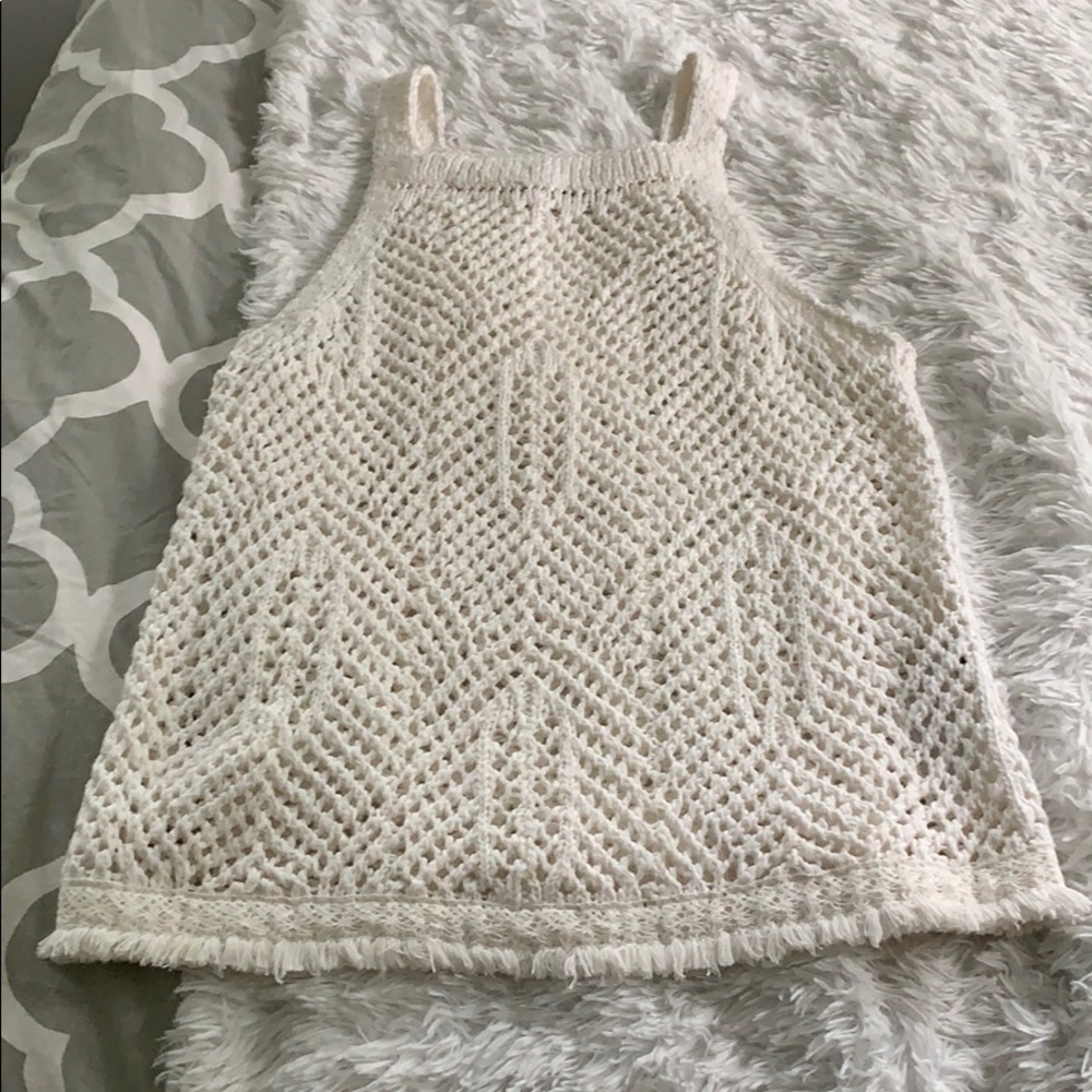 White sleeveless sweater